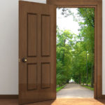 Door Opens onto Wooded park